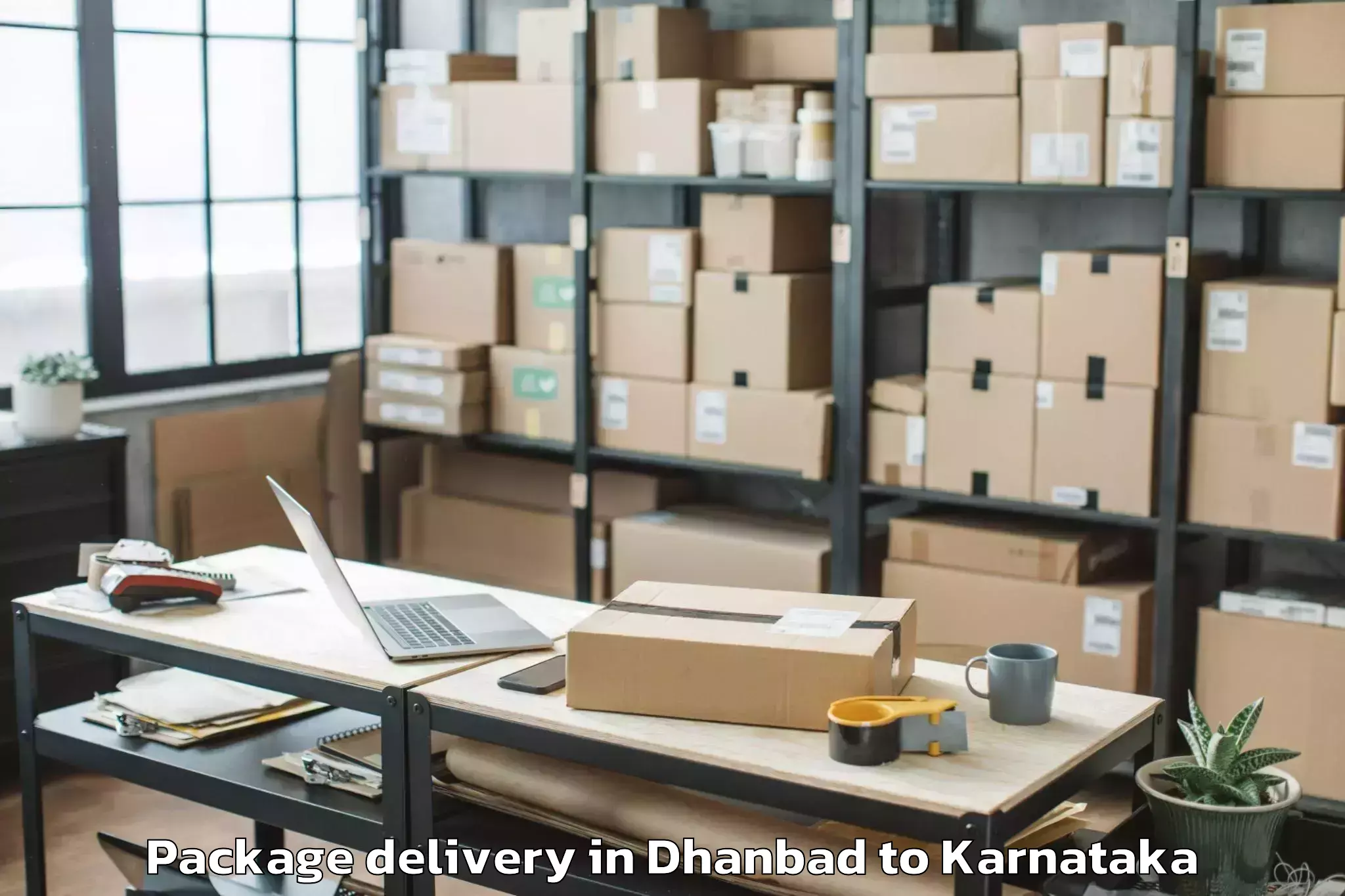 Quality Dhanbad to Baindur Package Delivery